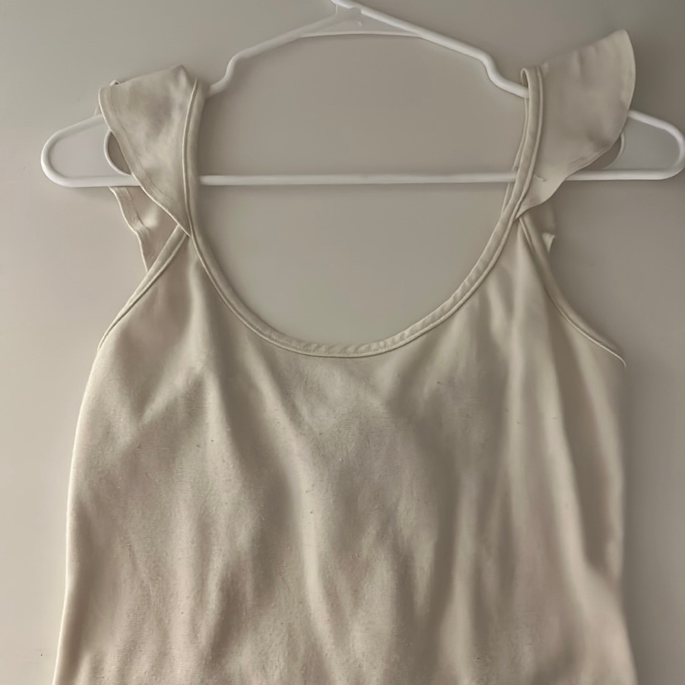 Open back, white body suit